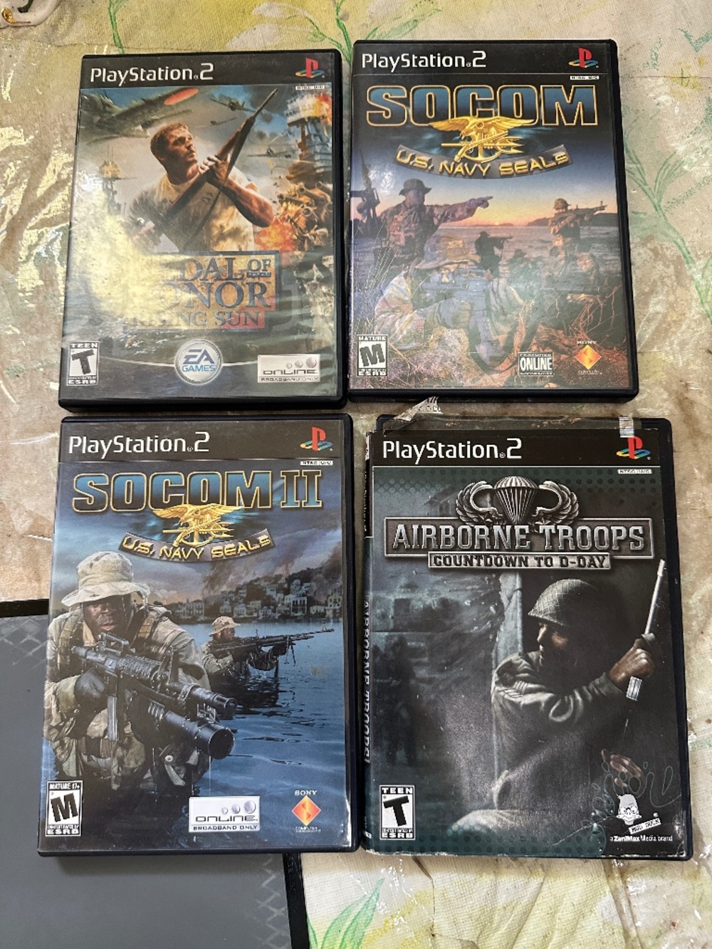 Lot of 4 PS2 Games Medal of Honor Socom US Navy Seals Airborne Troops US